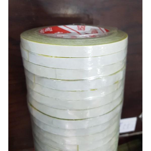 Băng keo 2 mặt 1F ruột vàng 23 yard