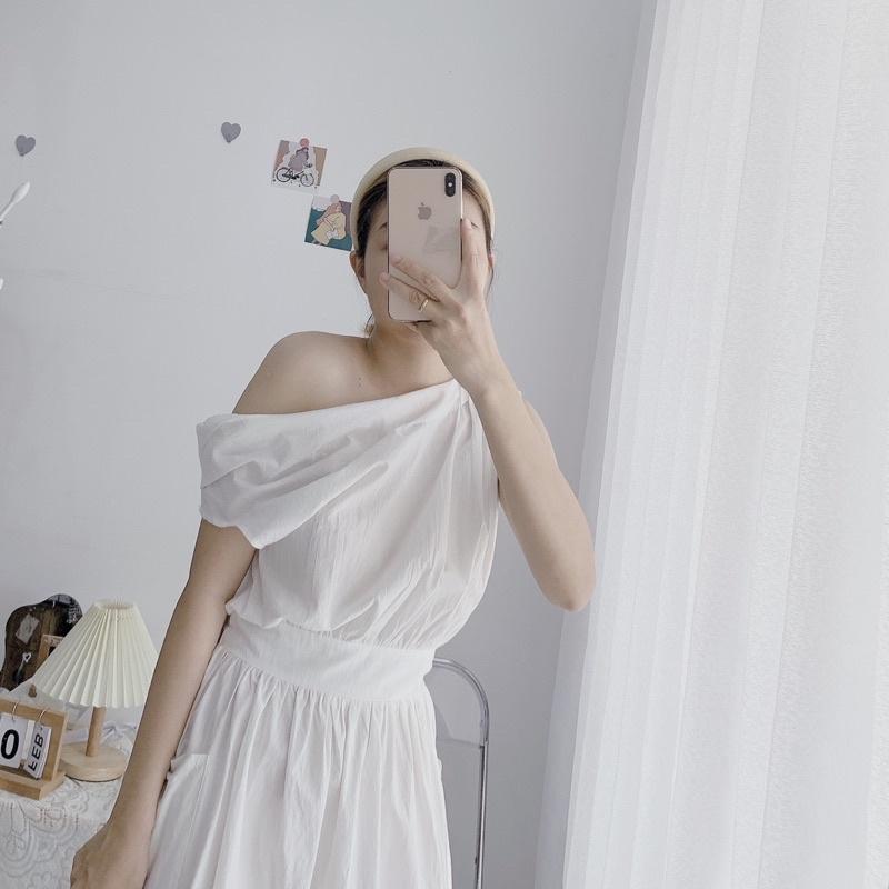 Đầm trắng lệch vai túi 2 bên
