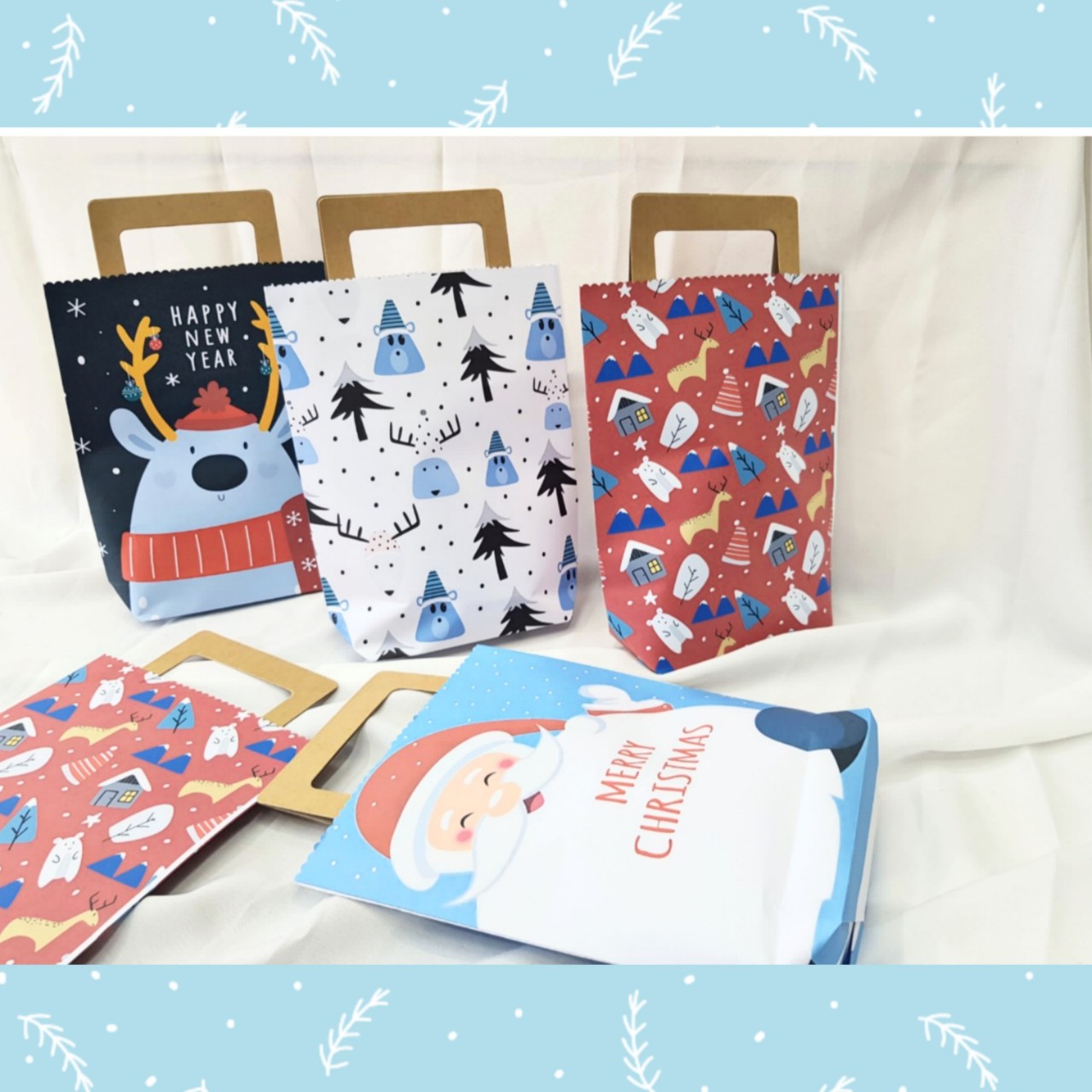 Combo 4 Túi giấy đựng quà giáng sinh 23cm x 17cm