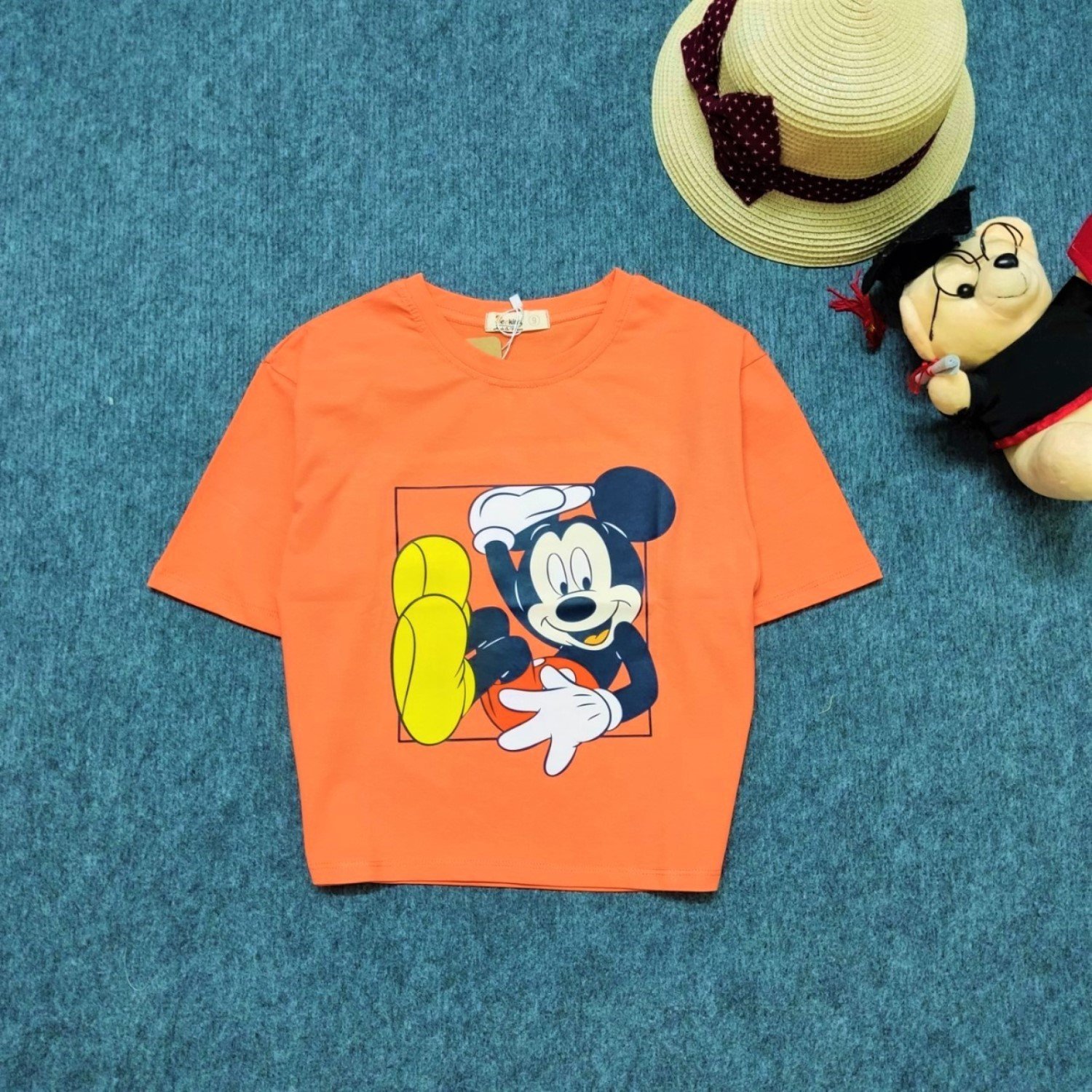 G0314 Áo thun croptop Mickey màu cam cho bé gái