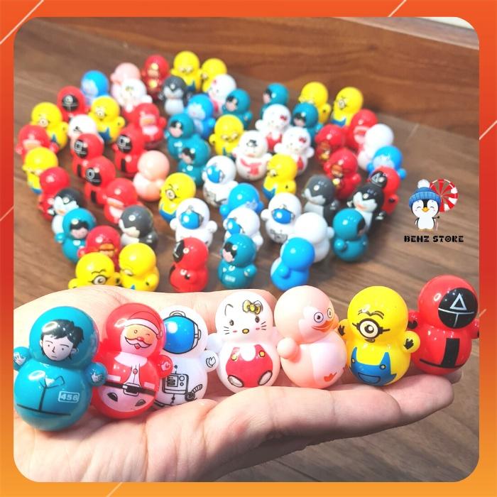 Lật đật đồ chơi mini dễ thương squid game, doremon, minion,pikachu,ông già noel, thần tài tết, chim cánh cụt BENZ STORE