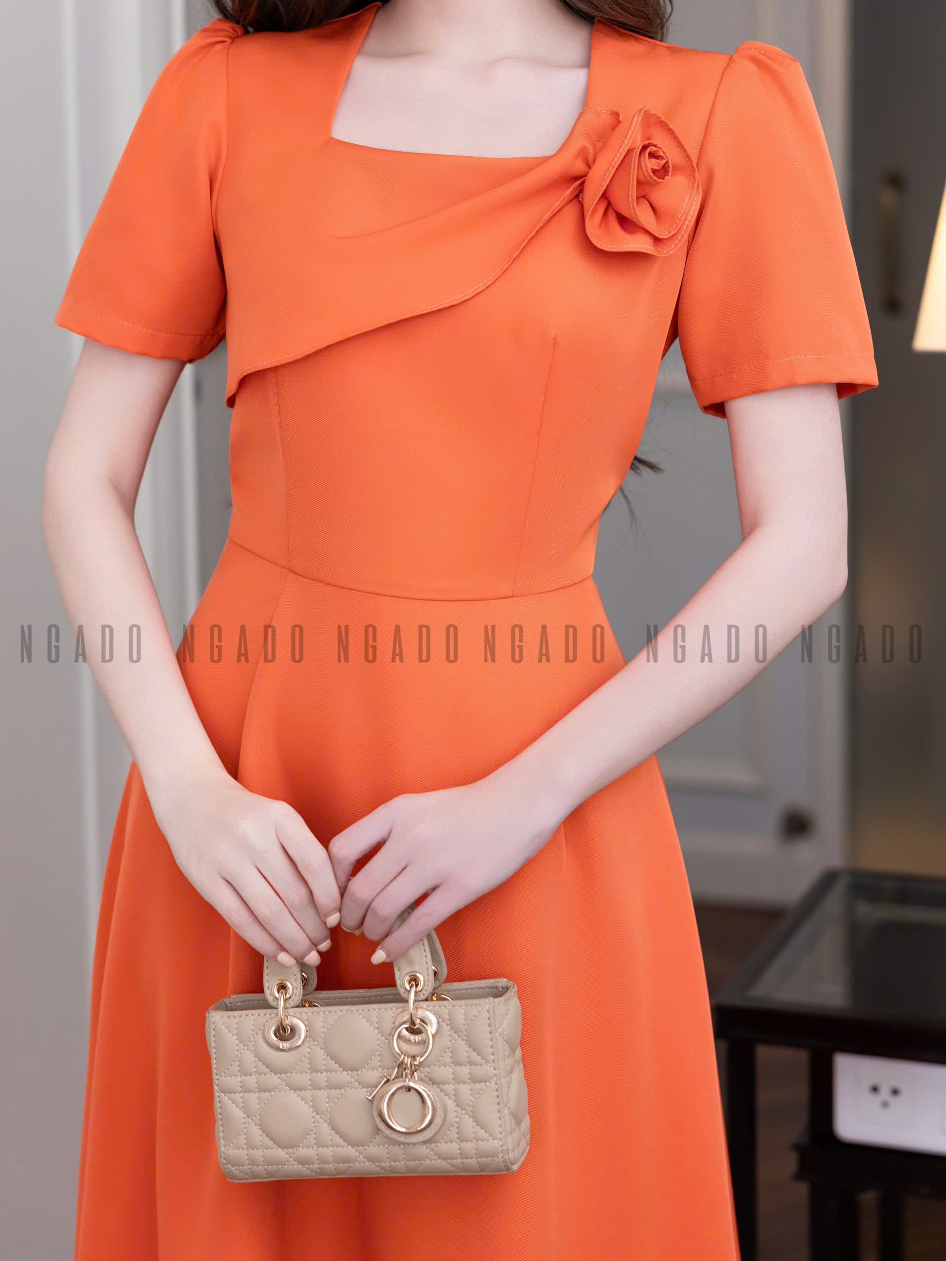 Đầm cam phối hoa NGADO , đầm nữ , đầm công sở , dự tiệc