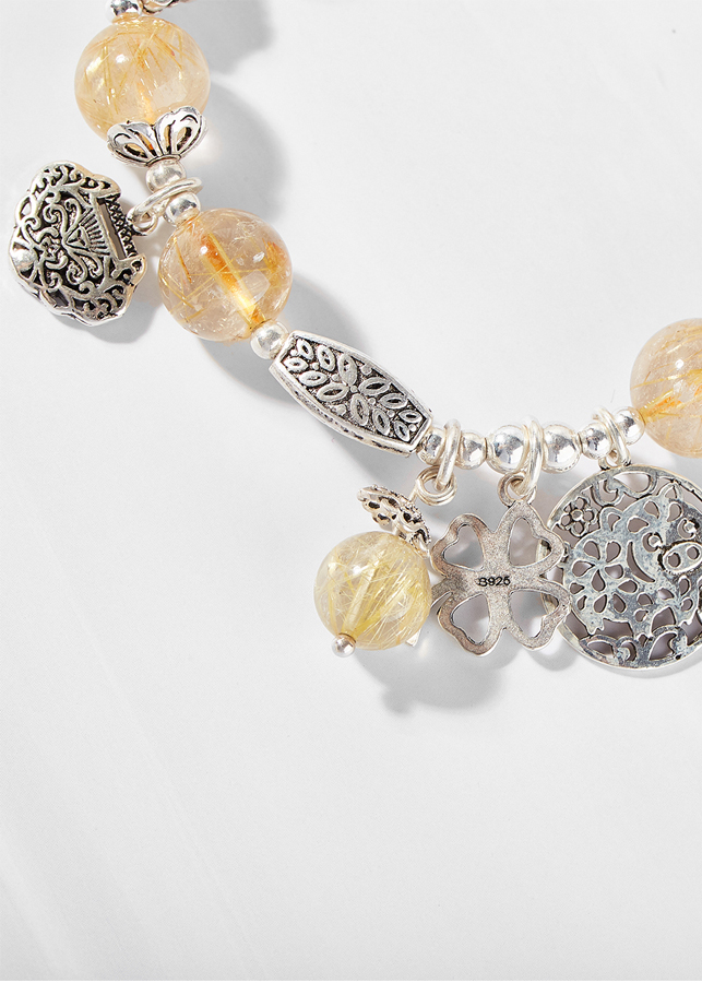 Vòng thạch anh tóc vàng phối charm túi như ý bạc Ngọc Quý Gemstones