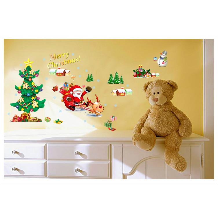 Decal trang trí Noel - Ông Gia Noel ngồi xe Tuần Lộc bay phát quà