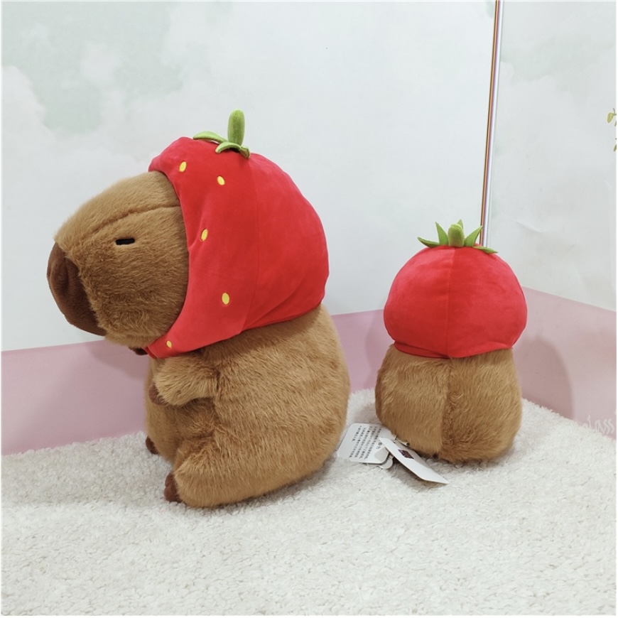 Thú nhồi bông capybara đội mũ dâu tây đáng yêu - Size từ 35cm đến 85cm - Quà tặng gấu bông capybara mang balô dâu tây trên lưng - Gối ôm chuột lang dễ thương cho bé