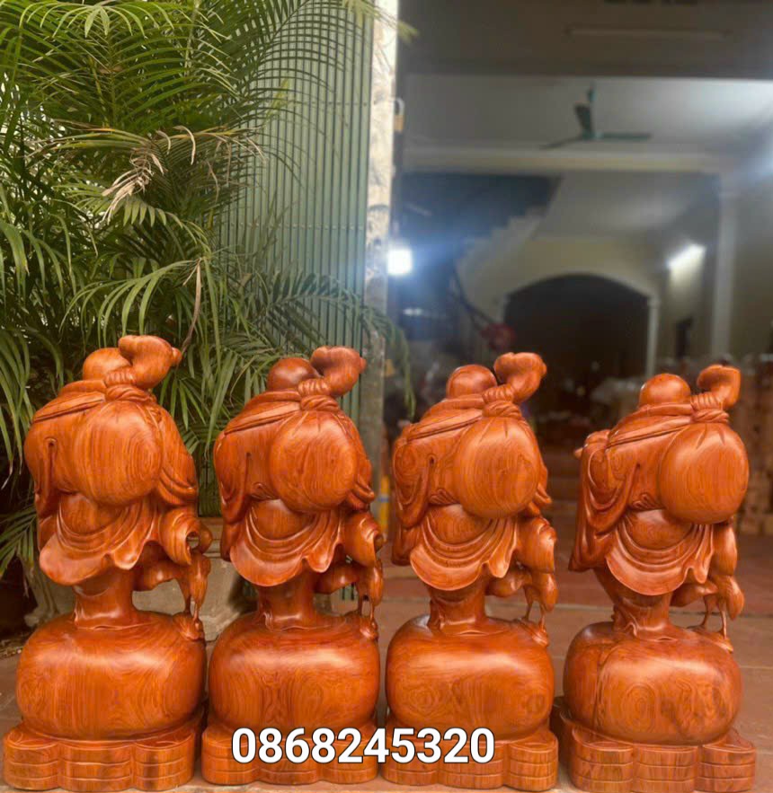 Tượng phật di lặc dắt cò phong thủy bằng gỗ hương đá kt cao 70×30×28cm