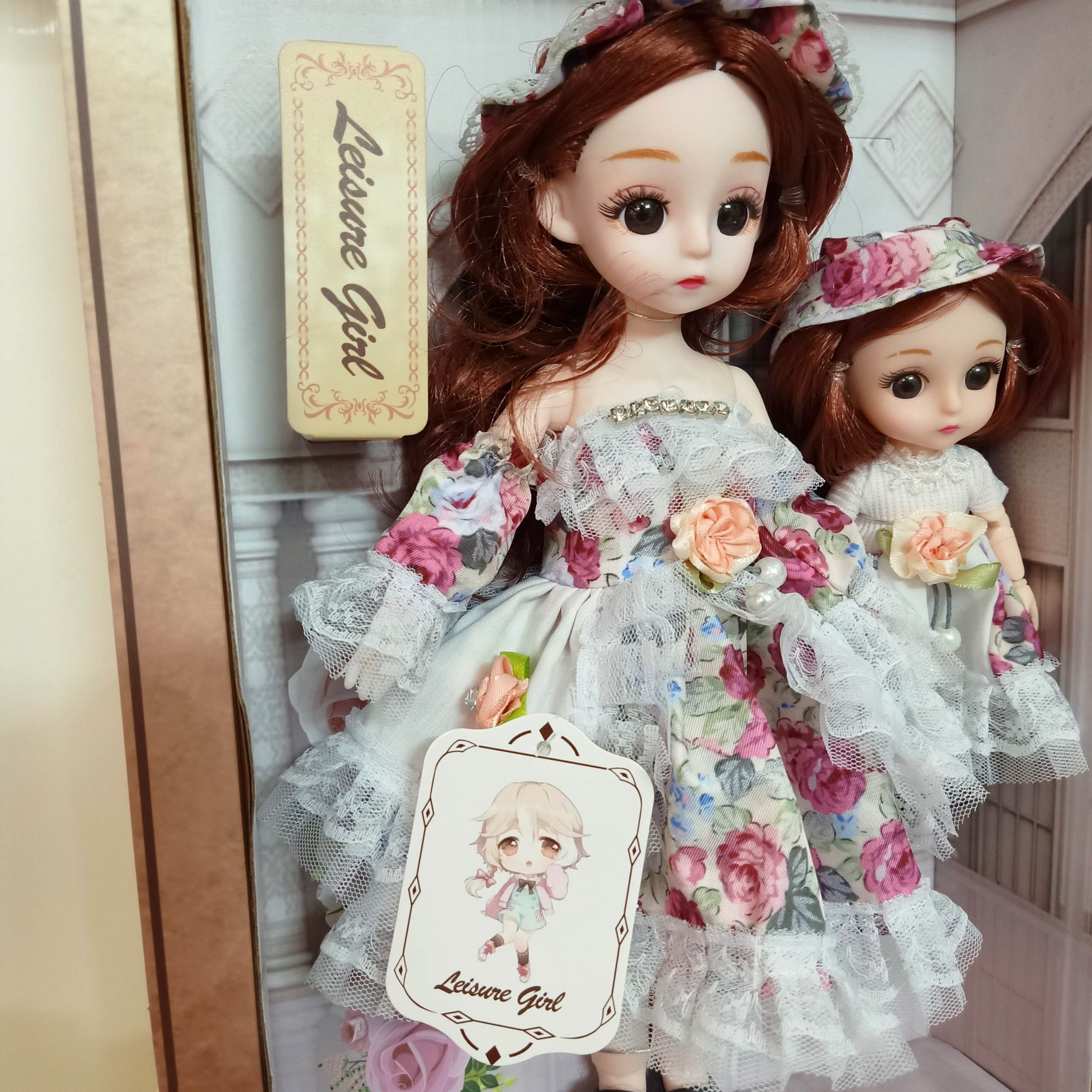 Hộp 2 búp bê chị em váy áo họa tiết đáng yêu mắt thủy tinh có các khớp tay chân linh hoạt