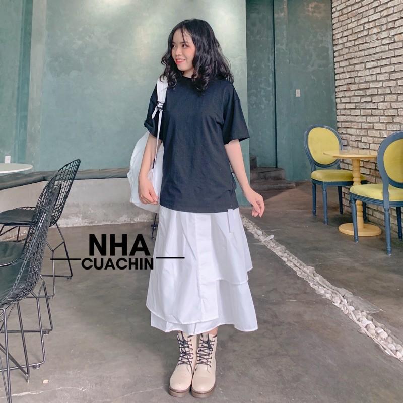 Chân váy trắng vạt thấp vạt cao