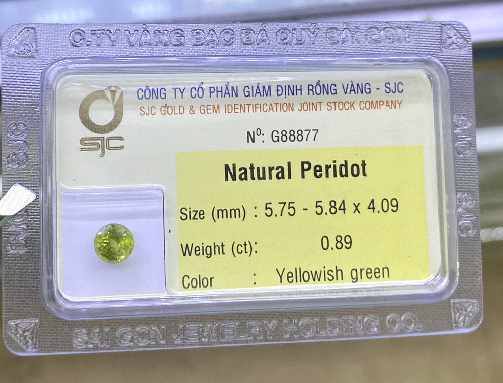 Viên đá peridot ngọc olivin kiểm định tự nhiên mài giác tròn phong thủy