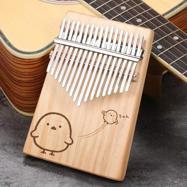 Đàn kalimba 17 phím gỗ thông khắc lazer nhiều mẫu- Tặng giấy dán và búa chỉnh âm Tonic Kalimba hàng chính hãng