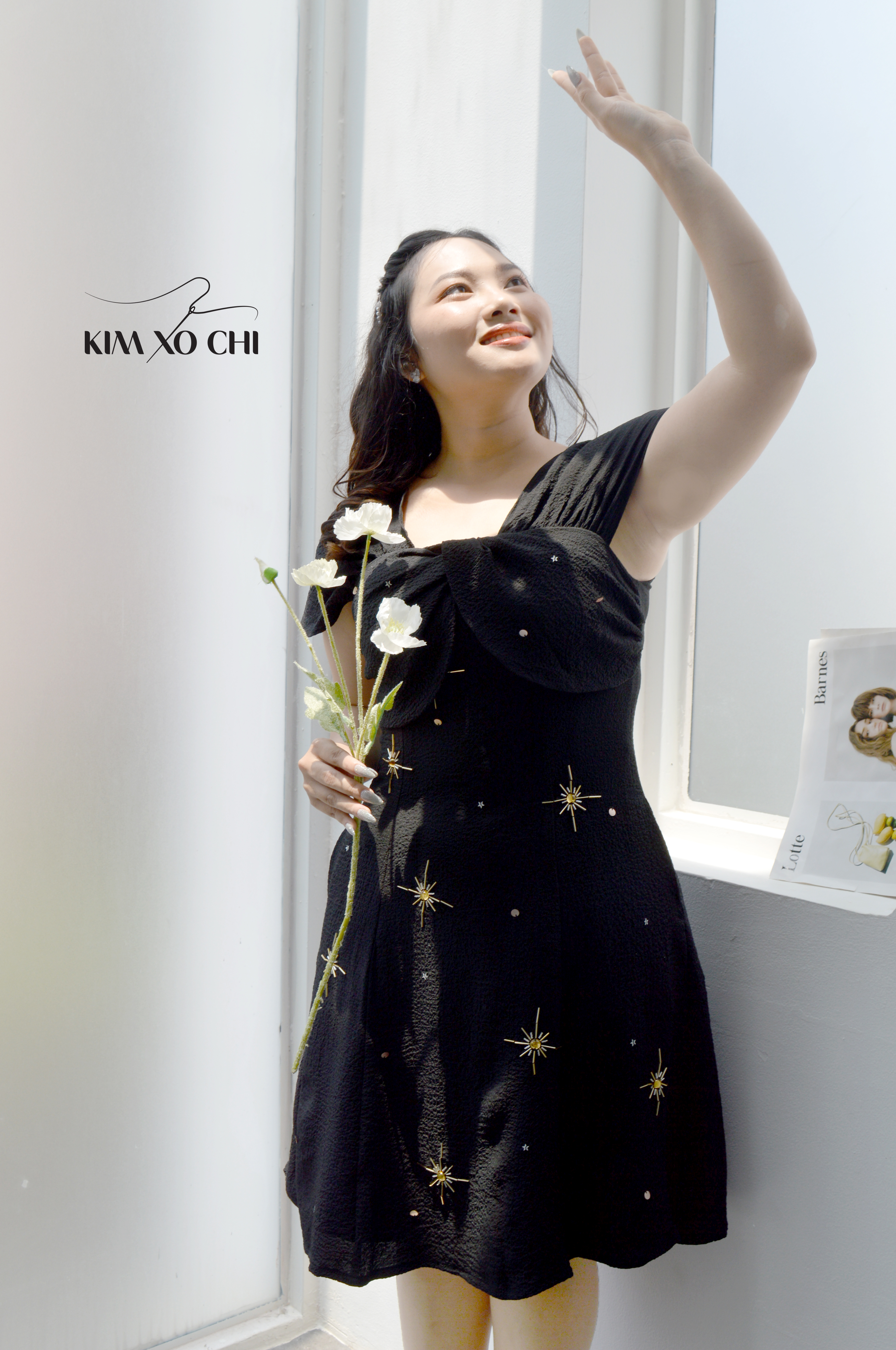 Đầm bigsize xoắn đính ngôi sao màu đen