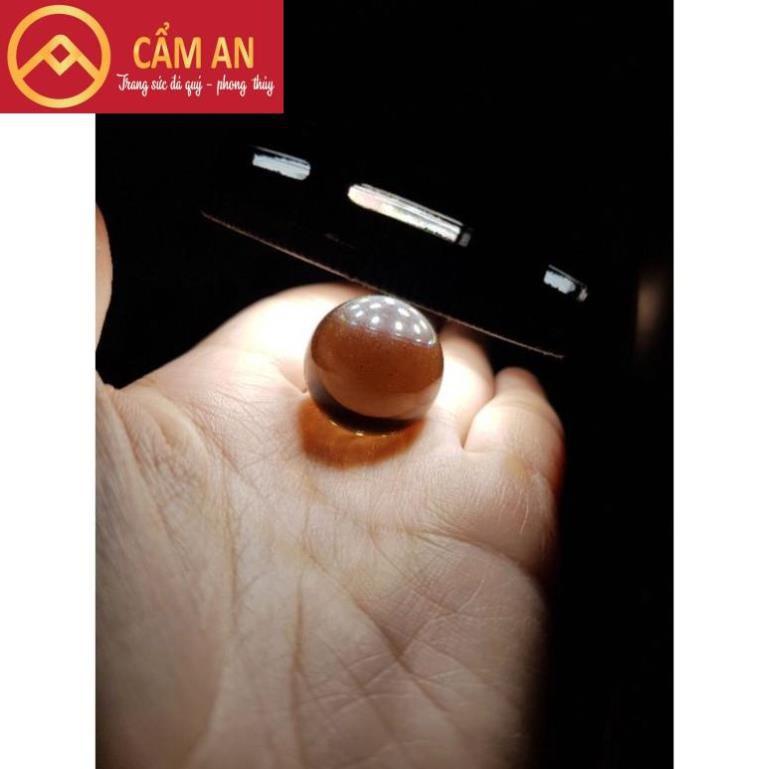 Quả cầu đá thanh tẩy tự nhiên màu vàng khói kích thước~ 2,5cm nhỏ gọn dễ mang đi.