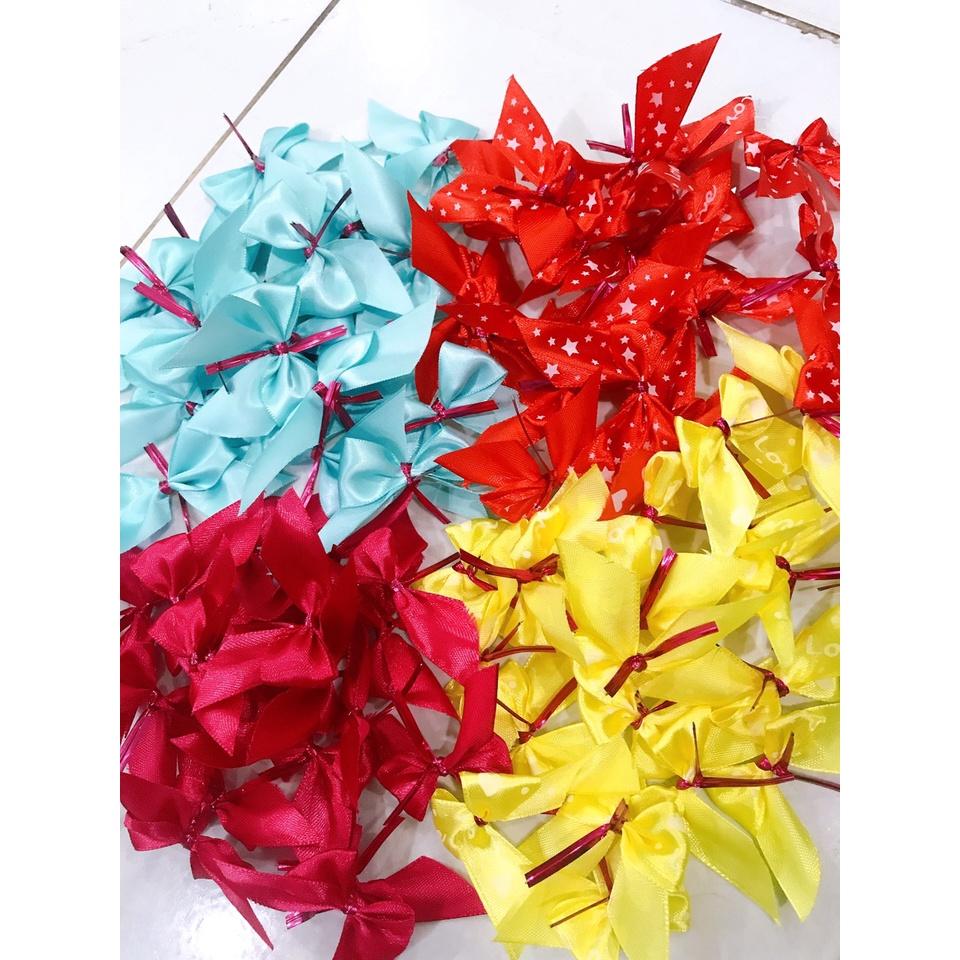 Nơ cột nụ tầm xuân, 2 cm, Bịch 20 cái