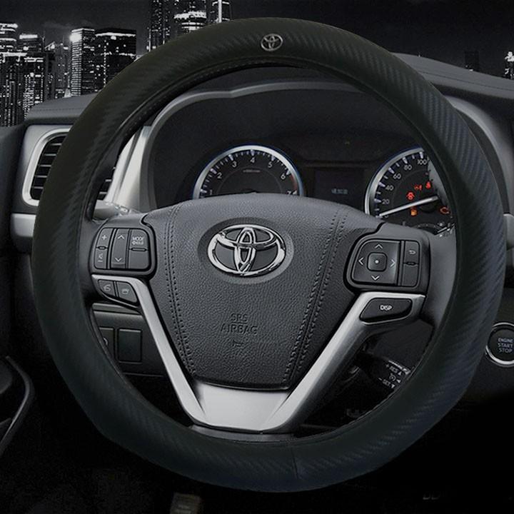 Bọc Vô Lăng Da Vân Carbon Logo Toyota - TB