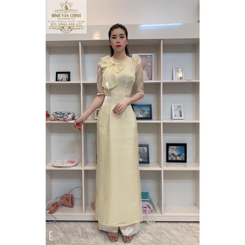 Áo dài tơ sống nơ ngực điểm trai full cổ màu da sáng
