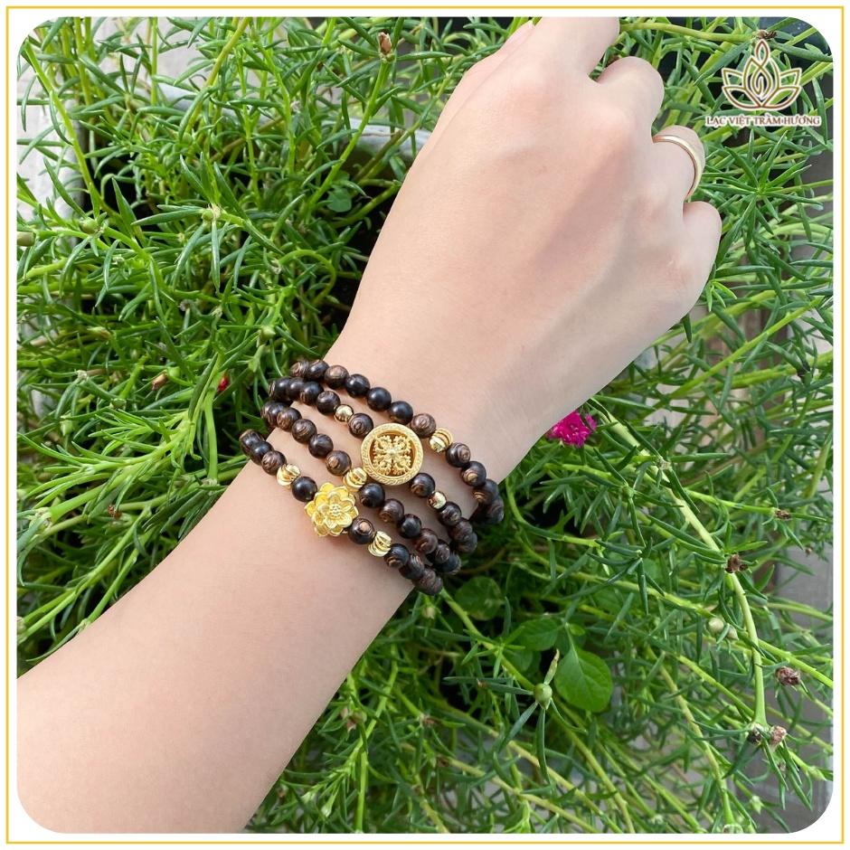 Vòng Tay Trầm Hương 108 Hạt Sánh Chìm Mix Charm Hoa Sen Vàng Phú Quý và Bánh Xe Pháp Luân Vàng - Lạc Việt Trầm Hương