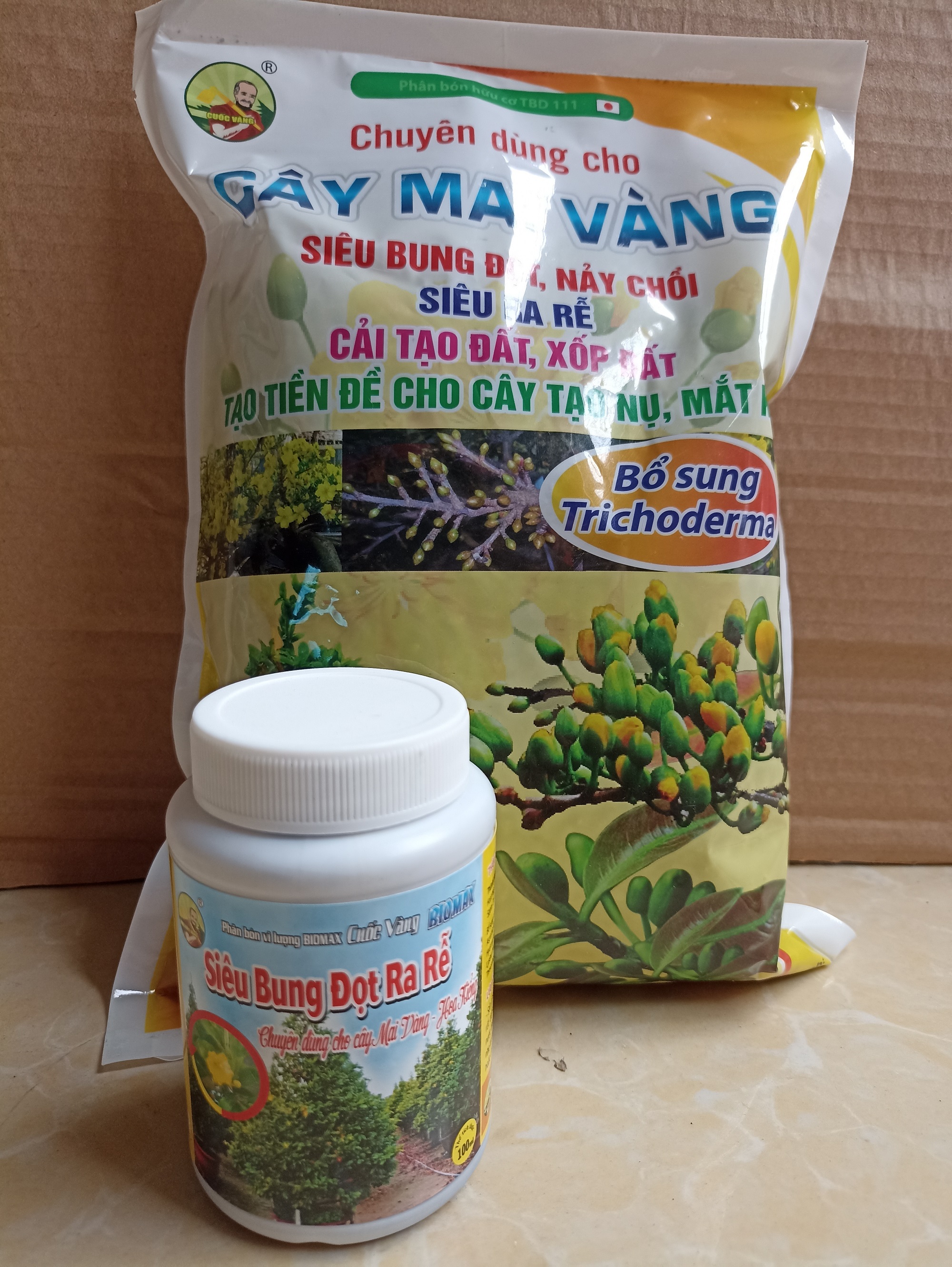 Combo chăm sóc mai vàng sau khi ra hoa ( 1 kg gói phân bón gốc+ 1 chai 100ml phun bung đọt, ra rễ)