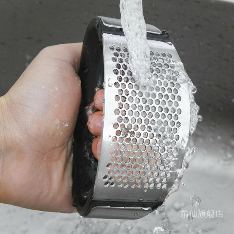 Dụng cụ ép hành tỏi cầm tay