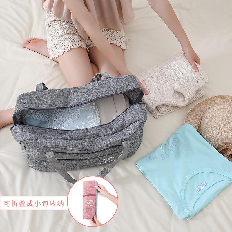 Túi du lịch xách tay siêu lớn chống thấm nước có thể gập lại cho nam và nữ Chuyến công tác ngắn Túi du lịch một vai Túi hành lý xe đẩy