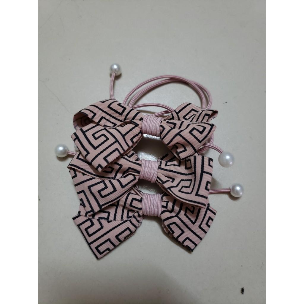 Dây cột tóc nơ dễ thương,nhiều màu cho các nàng chọ lựa