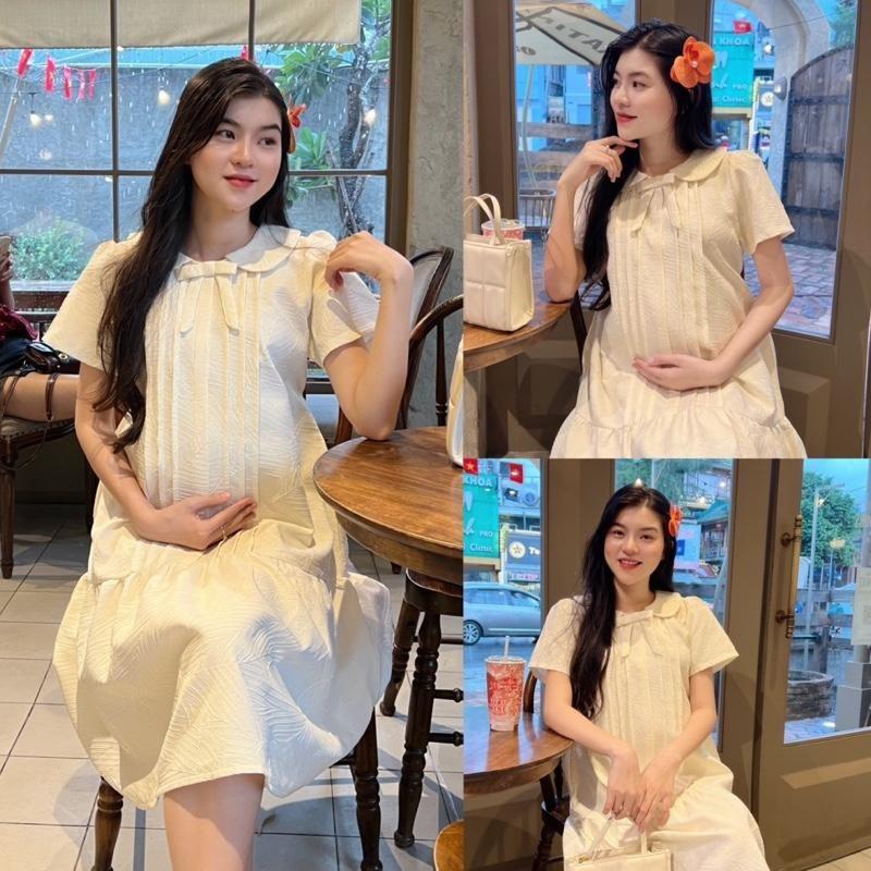 Đầm bầu tiểu thư cổ sen đính nơ vải gấm lụa gân 3D thanh lịch, sang trọng - Kem