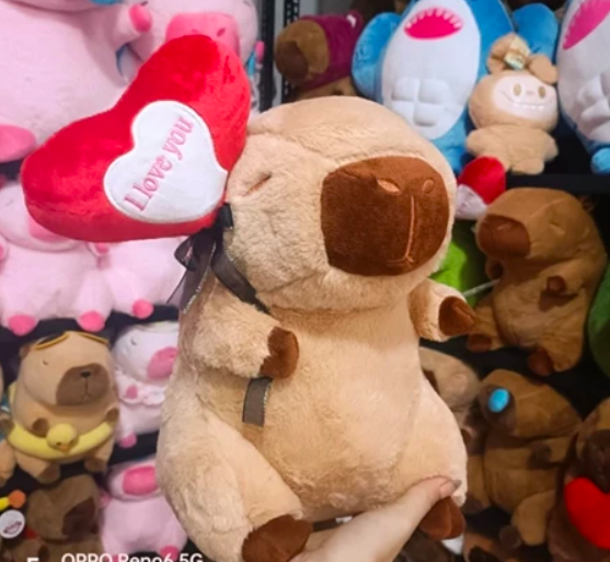 Thú nhồi bông Capybara đội quả táo đỏ - Size 42cm - Quà tặng gấu bông chuột lang lông mềm mịn đáng yêu