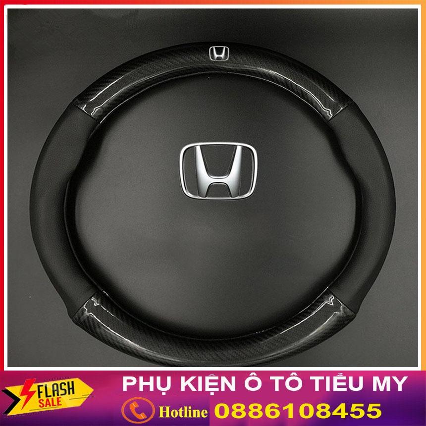Bọc vô lăng Carbon mẫu cao cấp có đính kèm logo MAZDA màu đen chất liệu da dày dặn thiết kế bắt mắt
