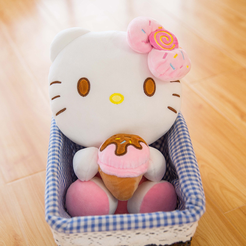 Gấu bông Hello Kitty ôm bánh đeo nơ dễ thương cho bé kích thước 30-40-55cm