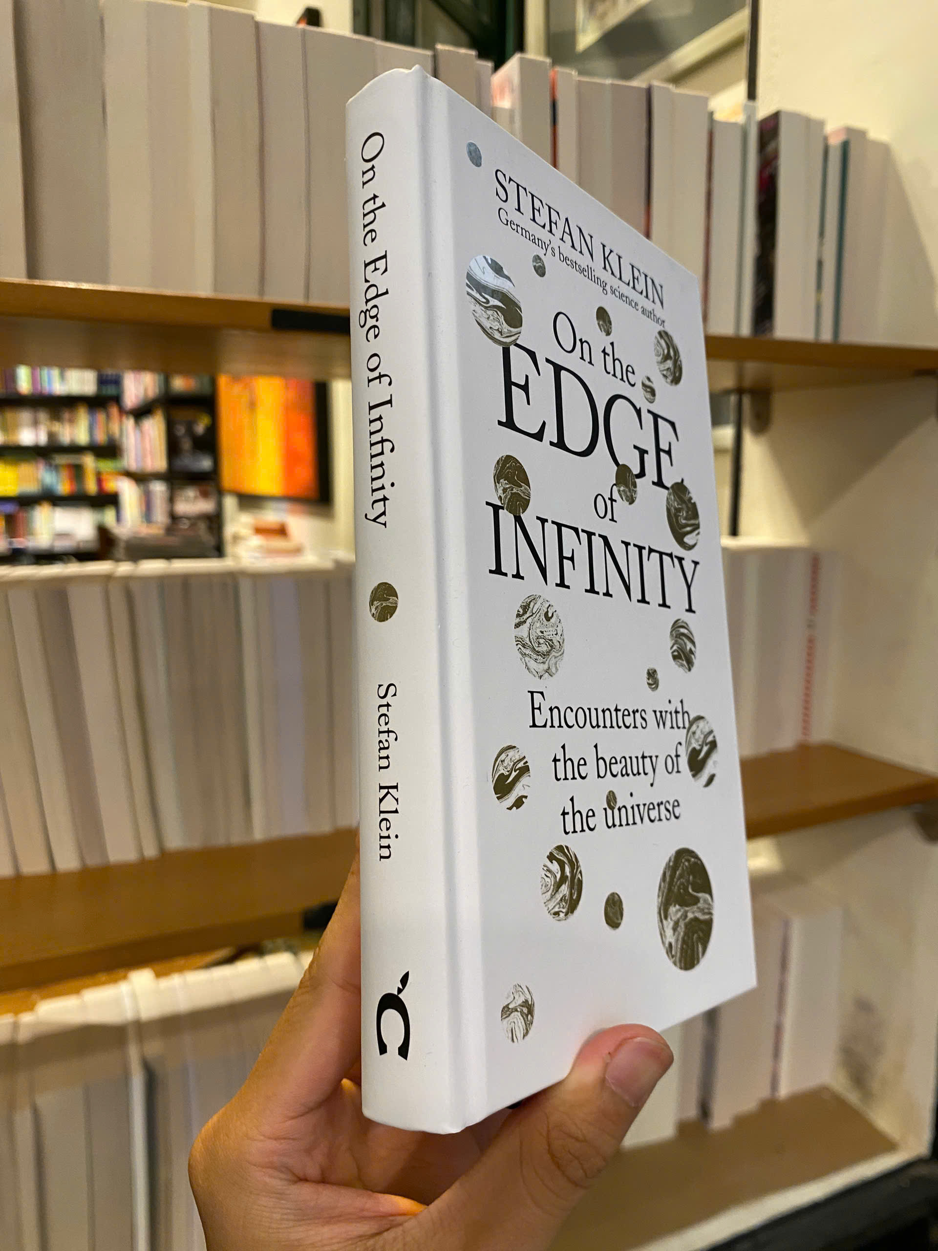 Sách - On the Edge of Infinity by Stefan Klein - Science/Nonfiction book in English - Bìa Cứng