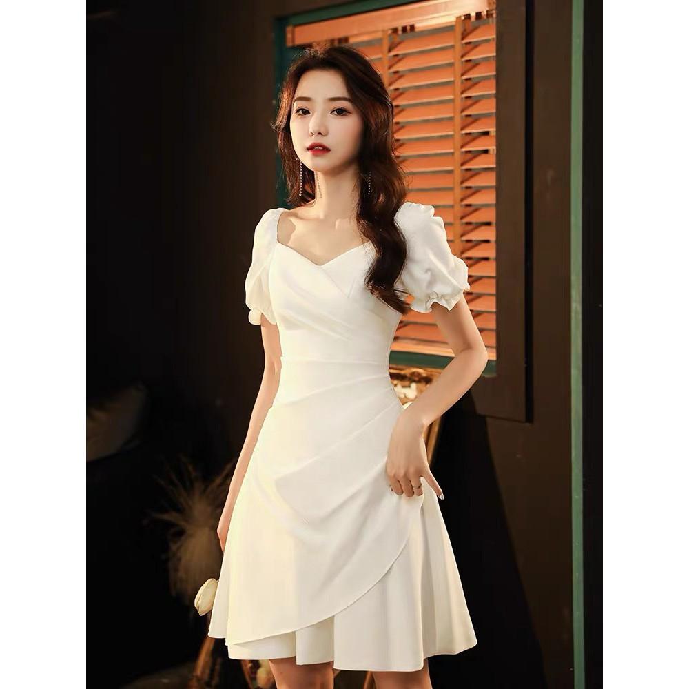 ĐẦM COTTONG TRẮNG ĐEN DỰ TIỆC CỔ ĐẮP CHÉO NHÚN 1 BÊN TAY NGẮN BO CHUN DÁNG XÒE
