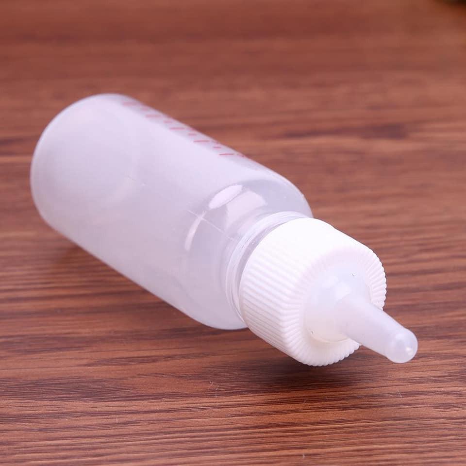 Bình đựng sữa cho chó mèo con