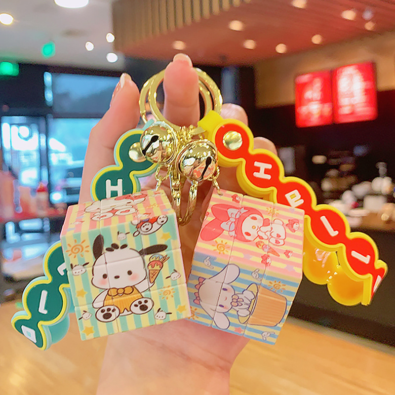 Móc Khóa Rubik Có Chuông Và Dây Đeo Silicon Nhiều Màu Sắc Dễ Thương