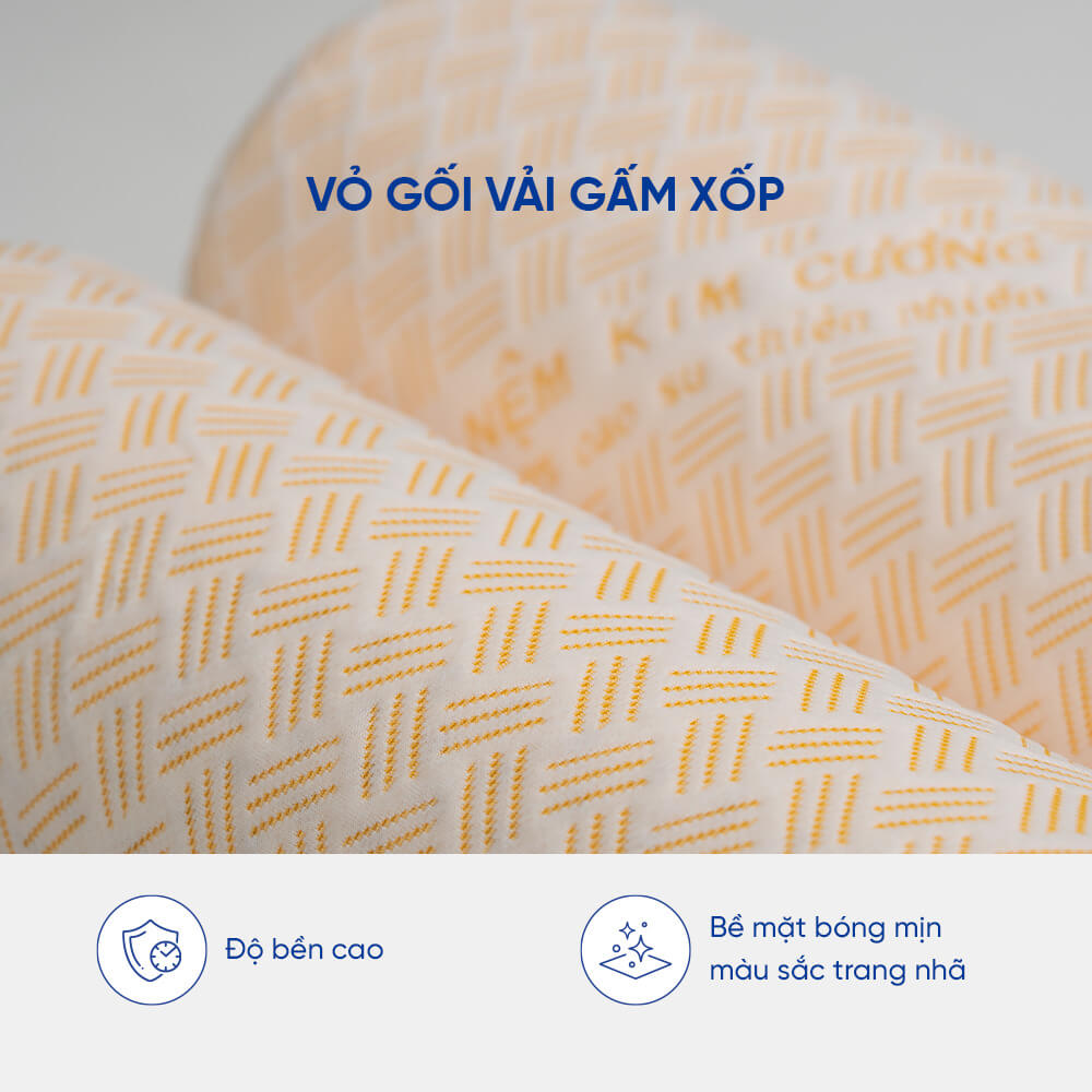 Gối ôm cao su cao cấp Kim Cương Honey 20x100cm thiết kế lỗ thông hơi xung quanh gối, giúp ngăn chặn nấm mốc tạo sự thoáng mát