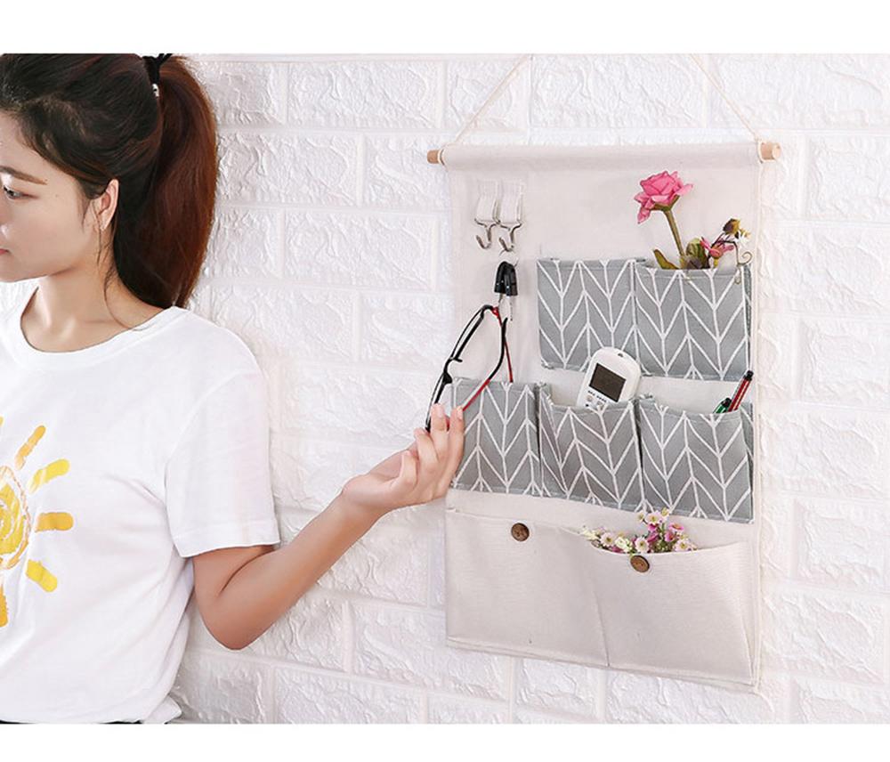 Túi vải treo tường bằng cottonlinen cao cấp với 7 ngăn đựngvà 2 móc đồ tiện dụng