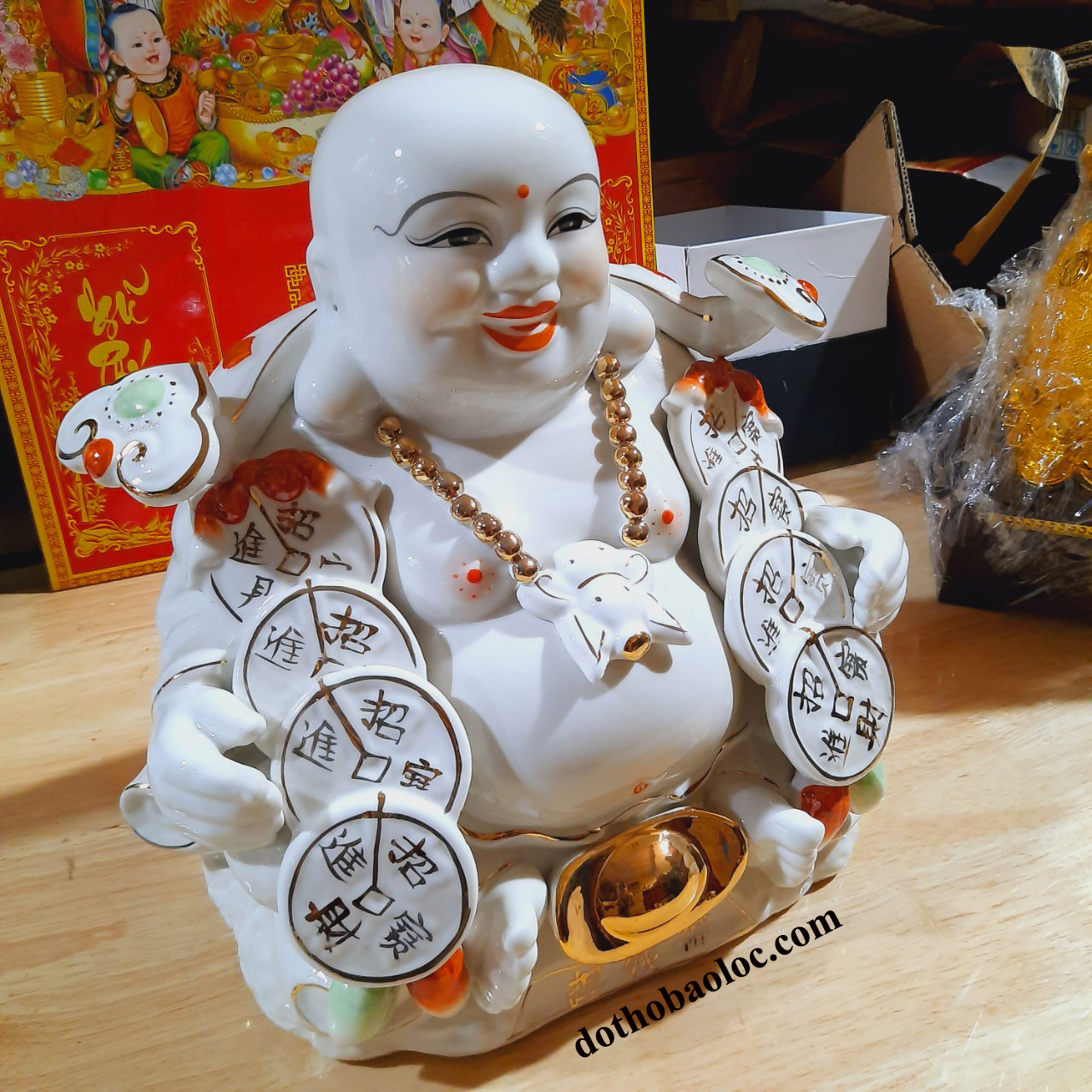 Tượng phật di lặc vác đồng t.iền bằng sứ cao 32cm