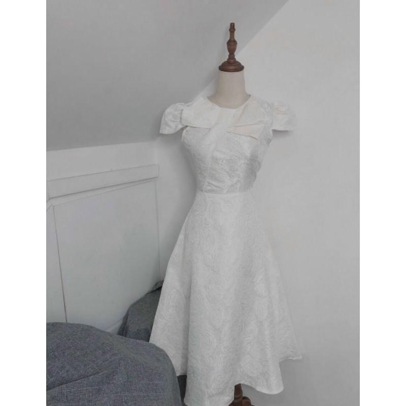 ĐẦM GẤM NƠ CỔ