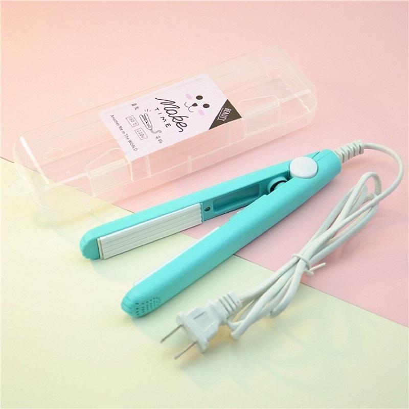 Máy duỗi tóc mini du lịch tiện lợi - Máy duỗi uốn mini tiện lợi , tặng kèm vỏ hộp xinh xắn.