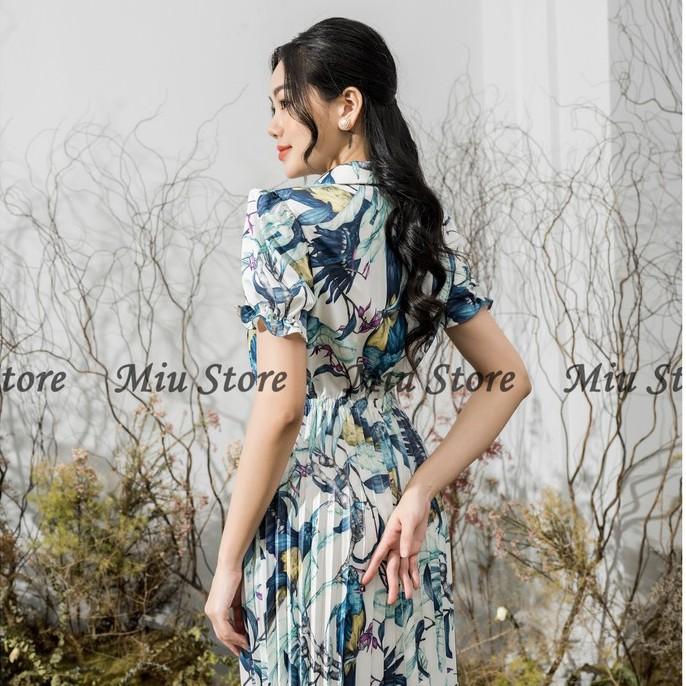 Đầm công sở thiết kế phối hoa dập ly eo thun