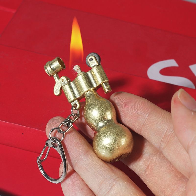 Vỏ Hột Quẹt Bật Lửa Xăng Đá Dophin HY-738 Kiêm Móc Treo Chìa Khóa Hình Quả Bầu Hồ Lô Màu Vàng Tài Lộc