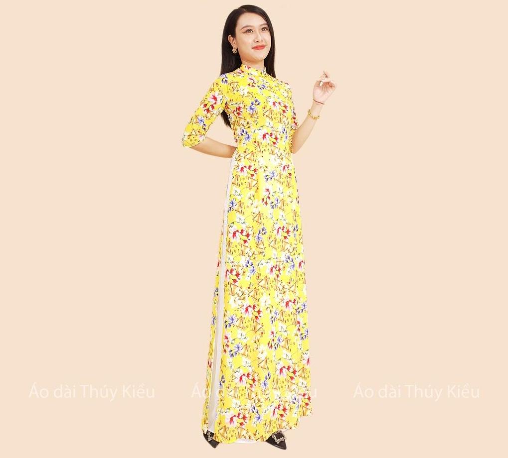 Áo dài in 3D lụa Nhật nền vàng hoa tam giác HN09