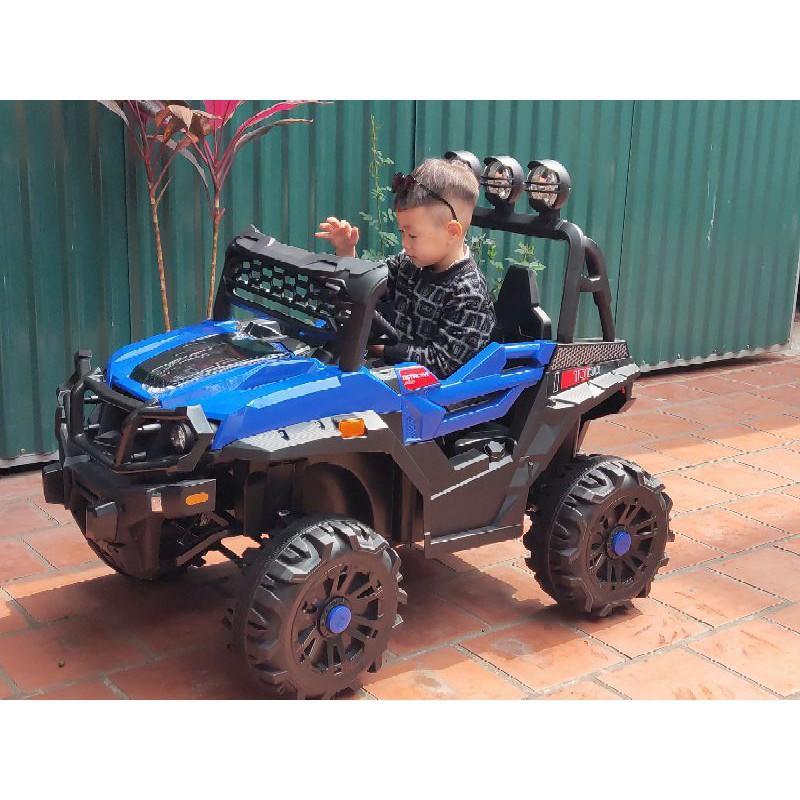 Ô tô thể thao địa hình cho bé M D X 908 4 động cơ ghế ngồi 2 bé.