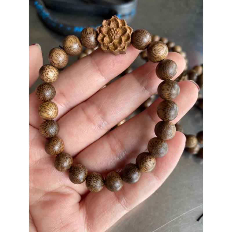 Vòng trầm hương mix charm hoa sen bằng Trầm