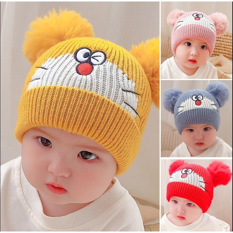 Mũ nón len Mèo Doremon đội mùa đông cho bé trai bé gái dưới 1 tuổi có Hai Quả Bông hình Mèo Doremon 2020