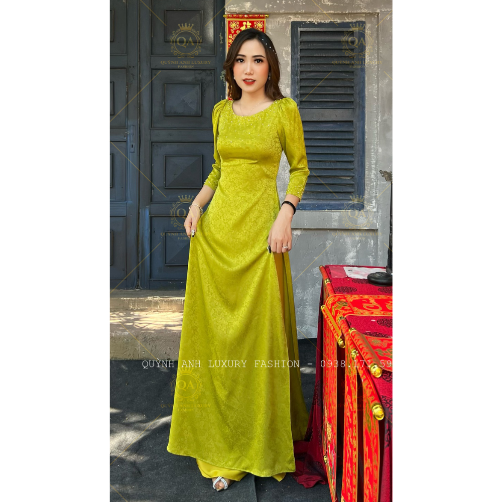 Áo Dài Xanh Bơ Truyền Thống Gấm Hoàng Gia Cổ Tròn Tay Lỡ Cao Cấp Kora Dress