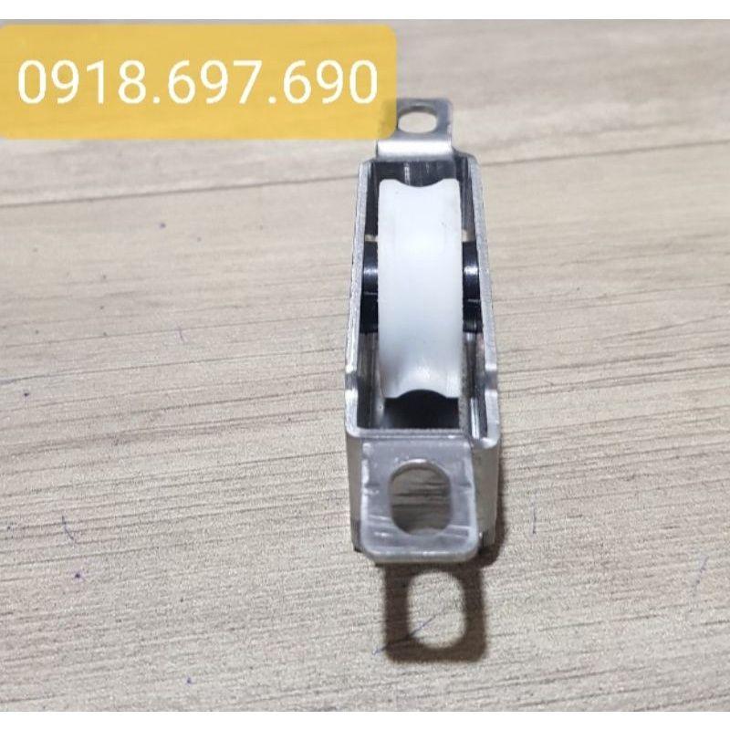 Bánh xe inox dập lỗ cửa sổ lùa nhôm xingfa chịu lực tải 80kg