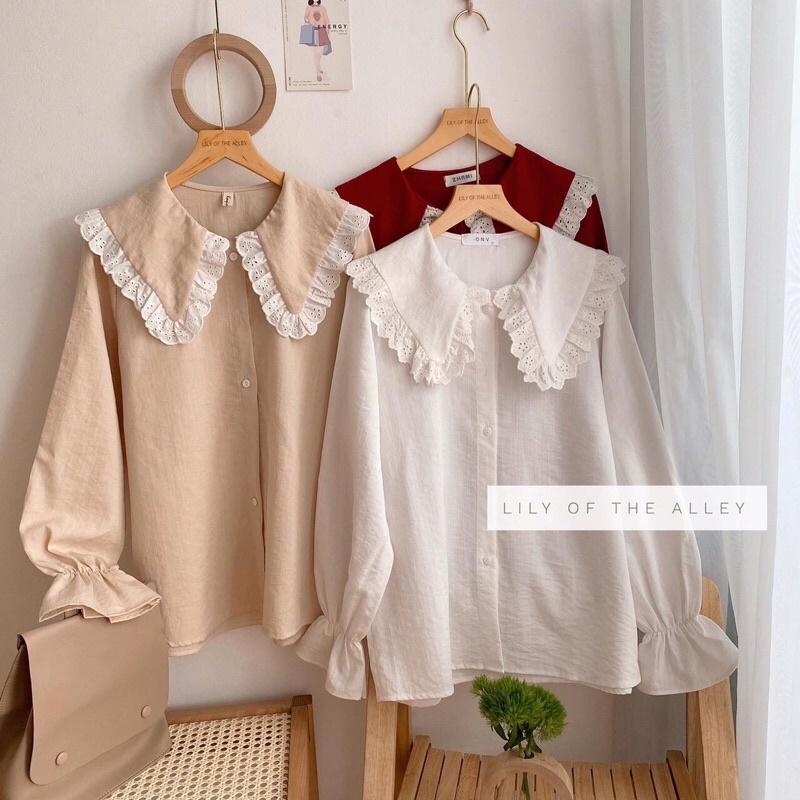 Sơ mi đũi xước cổ búp bê viền ren