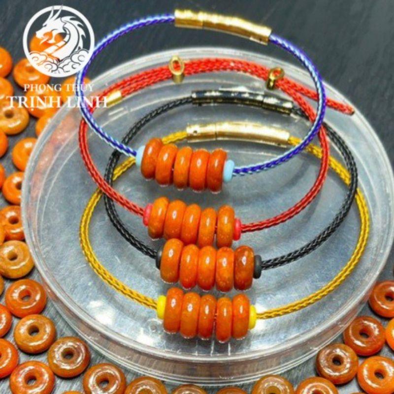 VÒNG TAY NGŨ ĐỒNG ĐIẾU HUYẾT ĐỎ CAM