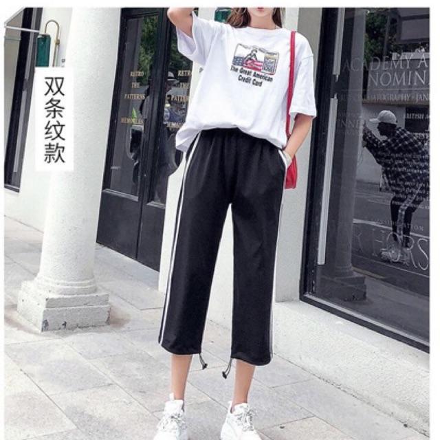 Quần jogger nữ có bo rút ở chan 2 sọc