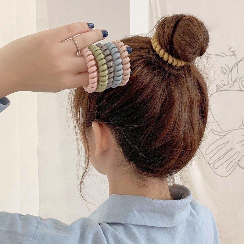Cột tóc lò xo phong cách hàn quốc