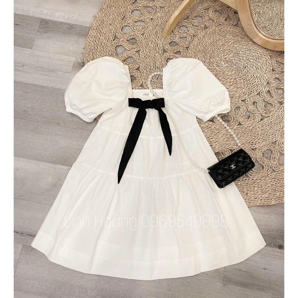 Đầm babydoll trắng cổ vuông tay phồng kèm nơ ngực